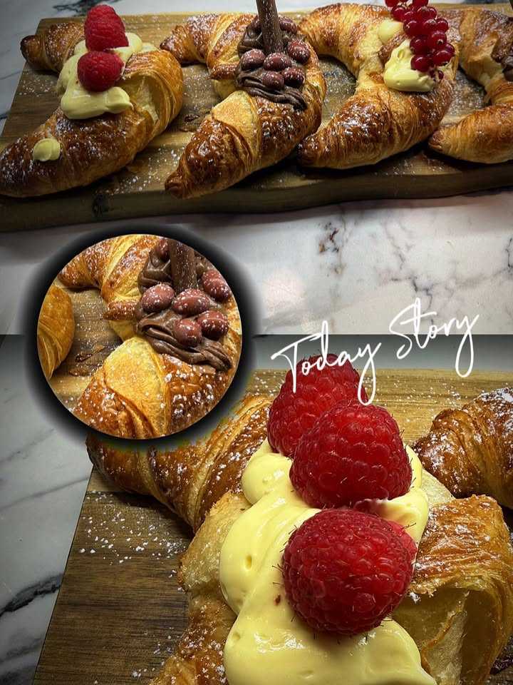 Brioche farcite e croissant da colazione esposti da Noto Bar